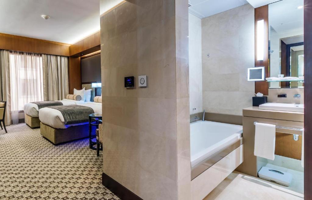 Ayla Grand Hotel Al Ain Exteriör bild A room at the hotel